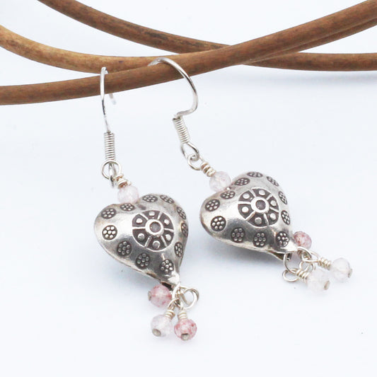 Sweet Rose'- Earrings, Heart-shaped Sterling Silver focal with Rose Quartz gemstones. These earrings are finished with sterling silver lever-back ear wires.