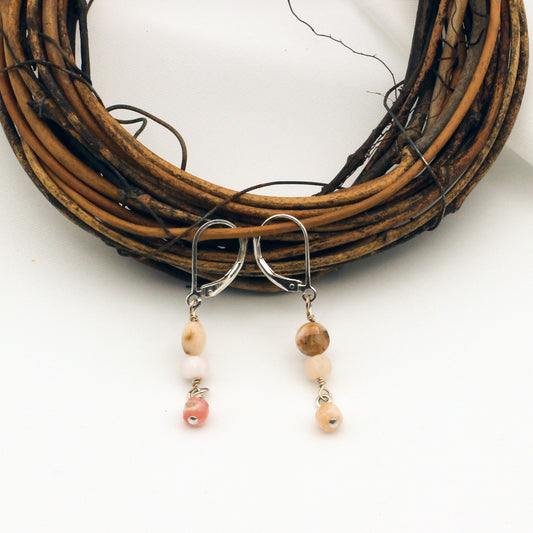 Handmade earrings are designed with Pink Opal Gemstones with sterling silver lever-back style ear-wires.