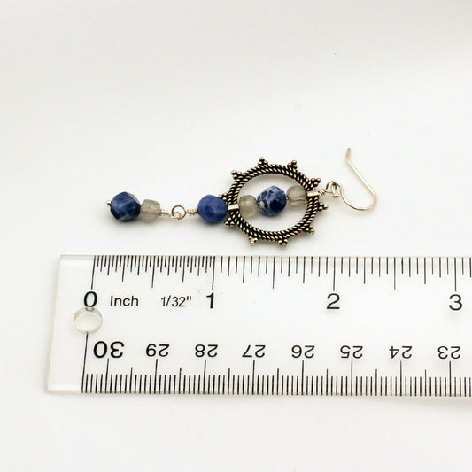 Handcrafted earrings with Sodalite and Labradorite Gemstones surround a Sterling Silver Sunburst, finished with Sterling Silver French Hook Ear-wires.