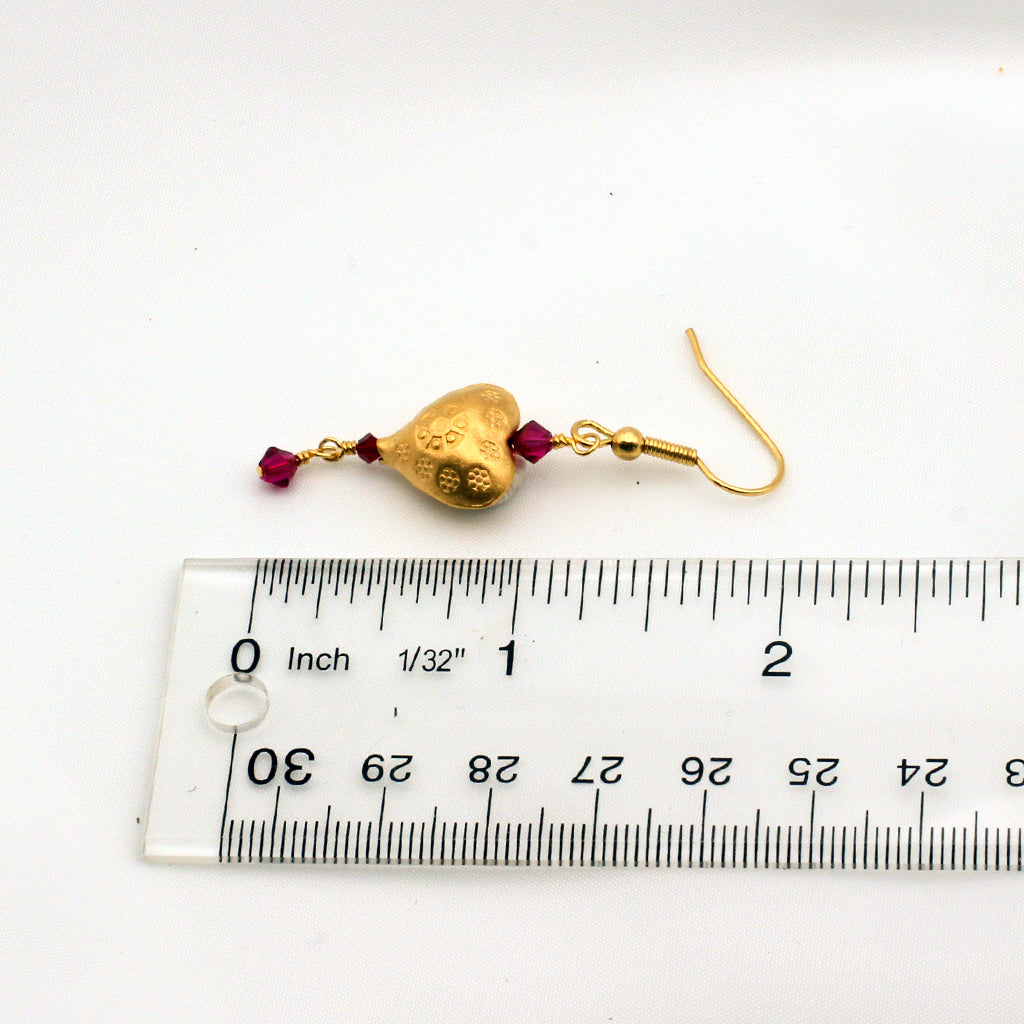 Gold vermeil heart earrings with ruby crystal bi-cone dangles.