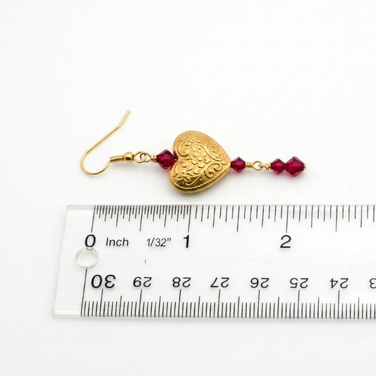 Gold vermeil heart earrings with ruby crystal bi-cone dangles.