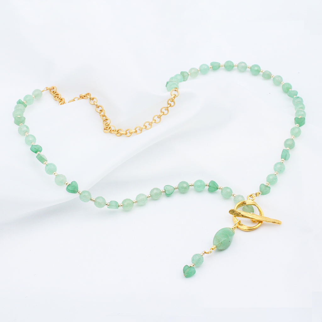 Featuring a Hammered Gold focal front closure and Green Aventurine Gemstones, sprinkled with Aventurine Gemstone Hearts.