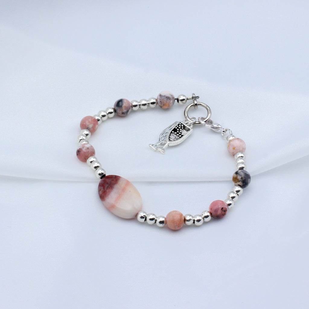 Wine glass charms and stunning Calcite Gemstones and Pewter beads. A secure Lobster Clasp closure.