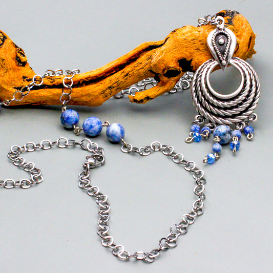 A Stainless Steel Chain, featuring a stunning Pewter Focal piece, Spot Stone Gemstones and Crystal Bicone. Secure with a Lobster Clasp closure.