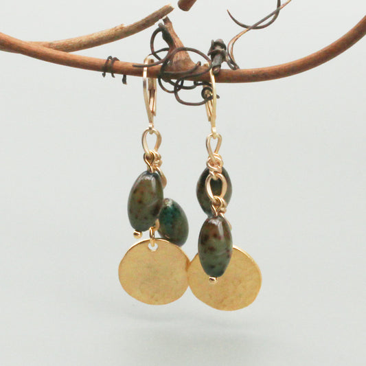 Earrings with a dangle of Vintage Oval Beads and Satin Gold Drops, embellished and set on a Satin Gold Chain. Finishing with a Lever-Back Ear Wire.