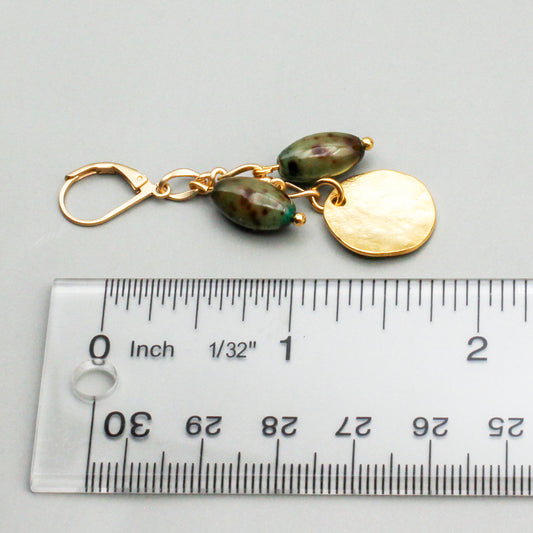 Earrings with a dangle of Vintage Oval Beads and Satin Gold Drops, embellished and set on a Satin Gold Chain. Finishing with a Lever-Back Ear Wire.