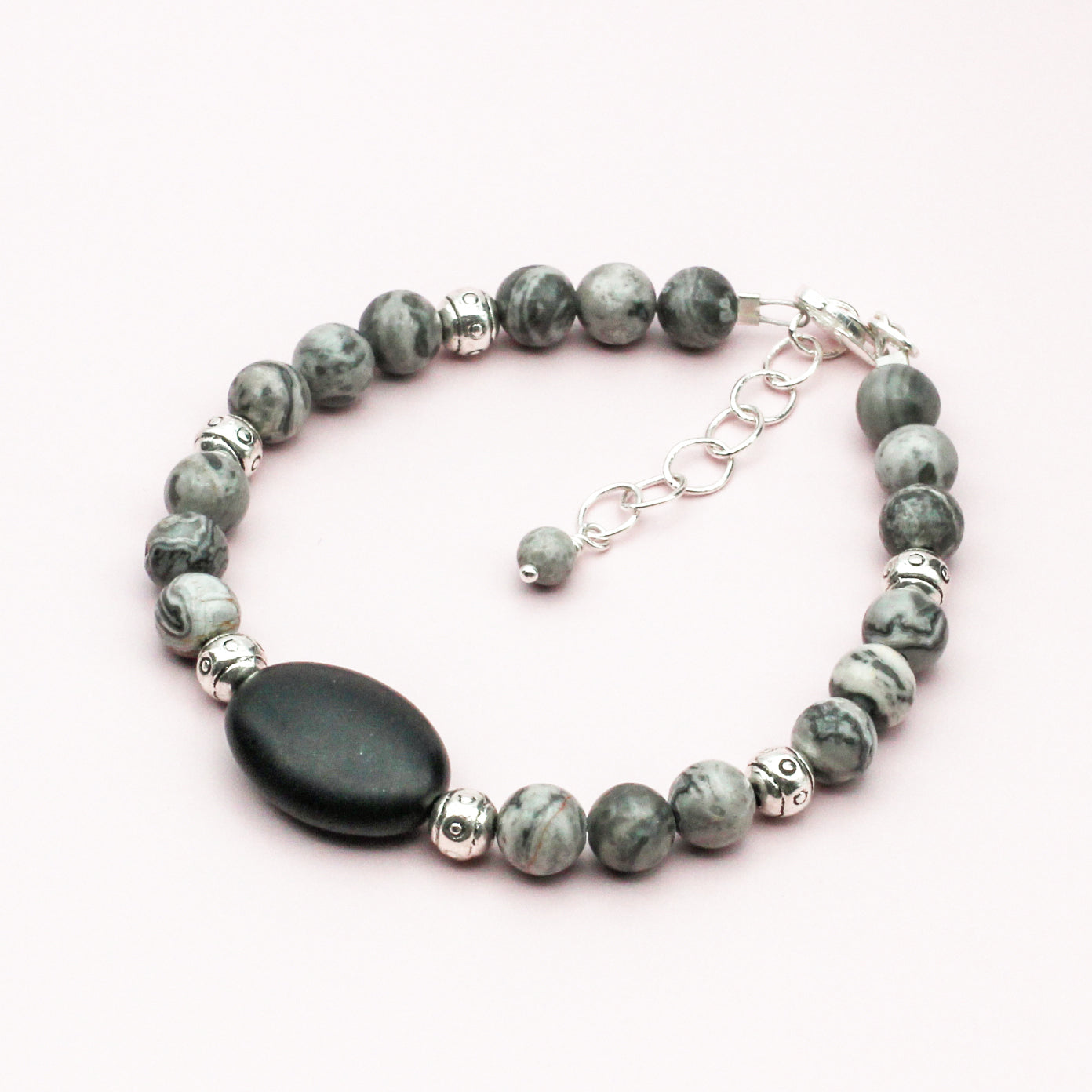 Bon Vivant bracelet with Jasper, Blackstone beads, pewter spacers and extender chain with lobster clasp.