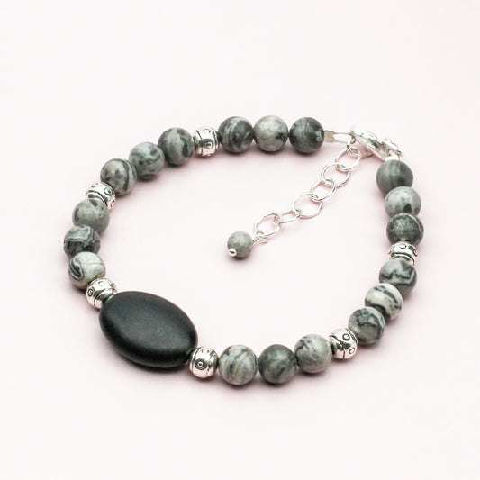 Bon Vivant bracelet with Jasper, Blackstone beads, pewter spacers and extender chain with lobster clasp.