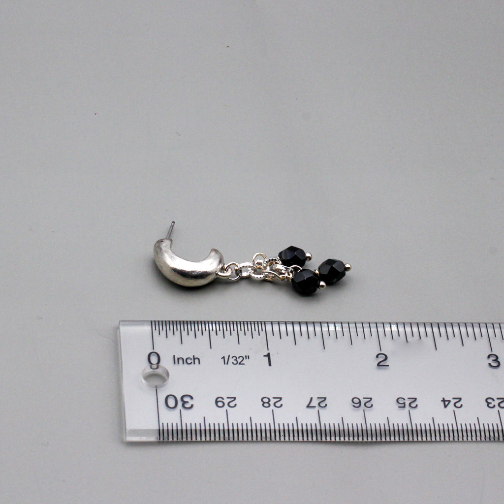 Silver metals and elegant black Czech beads adds depth and dimension to the design. Finished with stylish post-style ear-wires.