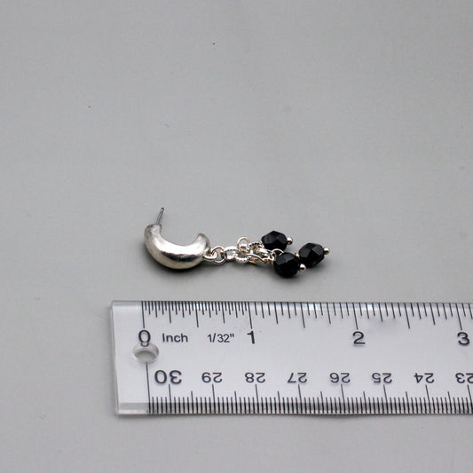 Silver metals and elegant black Czech beads adds depth and dimension to the design. Finished with stylish post-style ear-wires.