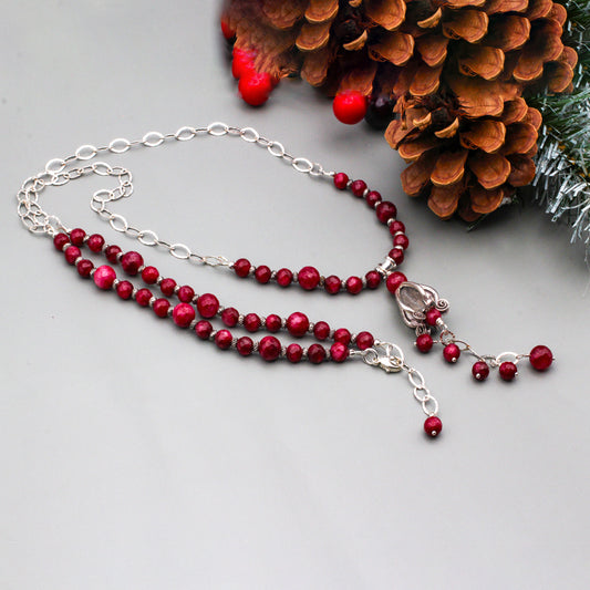 Sterling Silver charm paired with a faceted Agate Gemstone dangle. With a beautiful combination of gemstones and a Sterling Silver Chain, finished with a lobster clasp closure.