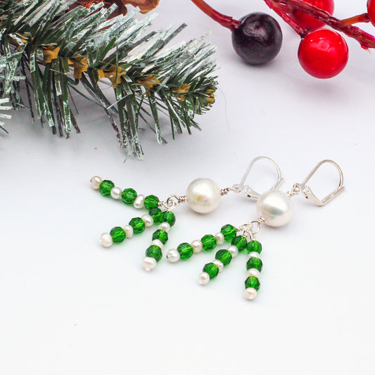 Feature elegant lever-back ear-wires, adorned with lustrous pearls and sparkling vibrant green crystals.