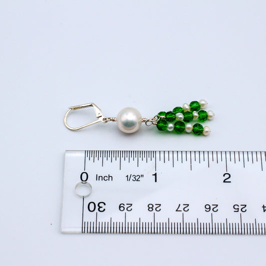 Feature elegant lever-back ear-wires, adorned with lustrous pearls and sparkling vibrant green crystals.
