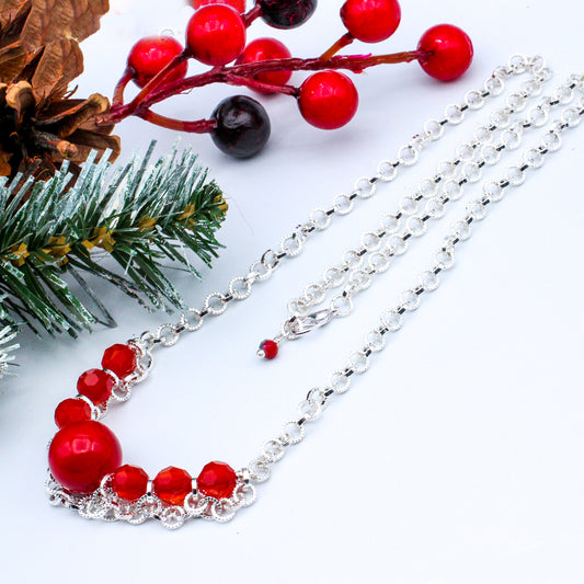 Circle in circle chain, adorned with Crystal Fire Polished and Coral Focal looped beads.