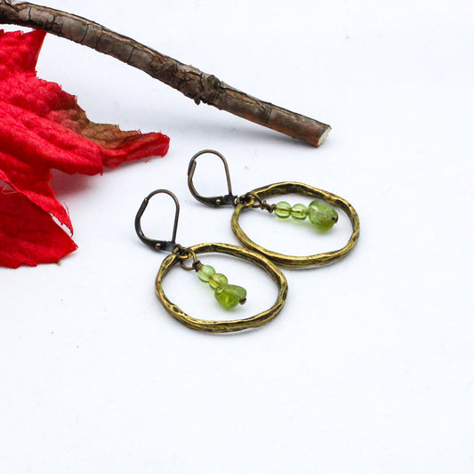 Hoop earring, featuring peridot gemstones with antique bronze lever-back ear-wires.