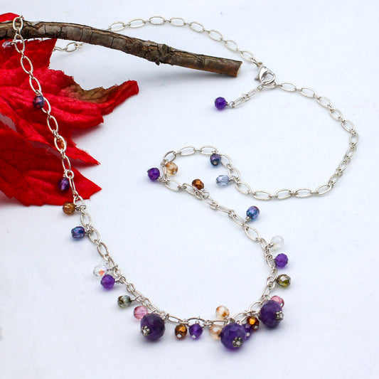A necklace or a bracelet - you decide! Shimmering Amethyst Gemstones, and sparkling Czech fire polish beads. The necklet is finished with a lobster claw clasp. Adjustable.