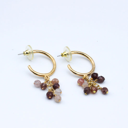Earrings feature delicate drops of Strawberry Quartz Gemstones. The gold Post Hoops hug the ear for a subtle yet stunning touch.