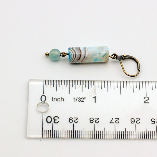 Agate Tubular Gemstones and Calcite gemstones, each dangling from Antique Bronze Lever-back Ear-wires.