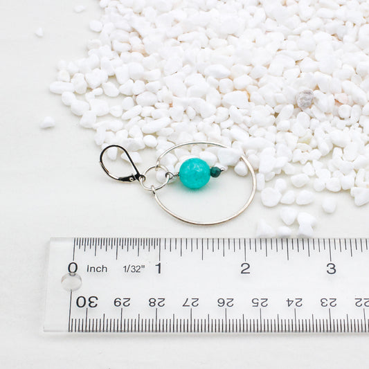 Featuring aqua Agate and Turquoise gemstones with hand-forged sterling silver hoops. Finished with lever-back ear wires.