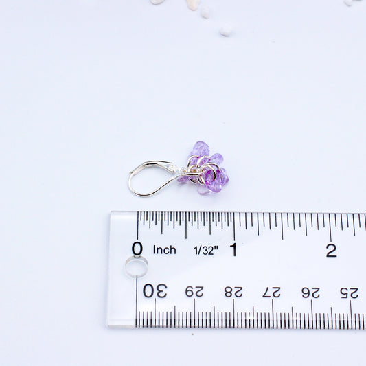 Amethyst Gemstones, accented by Pewter Spacer Beads, create a stunning contrast against the Silver Electroplated Metals.