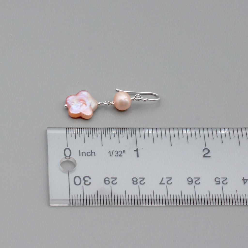 Round and intricately detailed freshwater pearls, gracefully suspended from Sterling Silver fishhook ear-wires.
