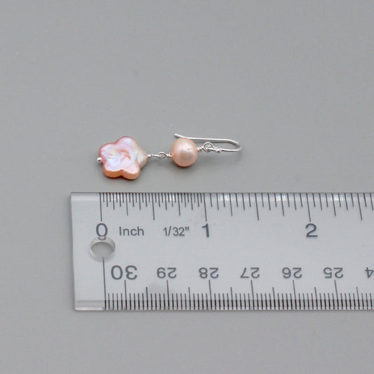 Round and intricately detailed freshwater pearls, gracefully suspended from Sterling Silver fishhook ear-wires.