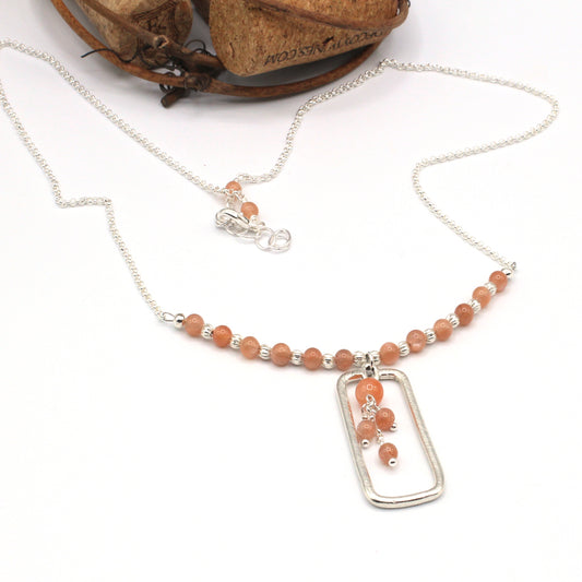 Understated elegance necklace, warm Sunstone gemstones, sterling-plated rolo chain. 