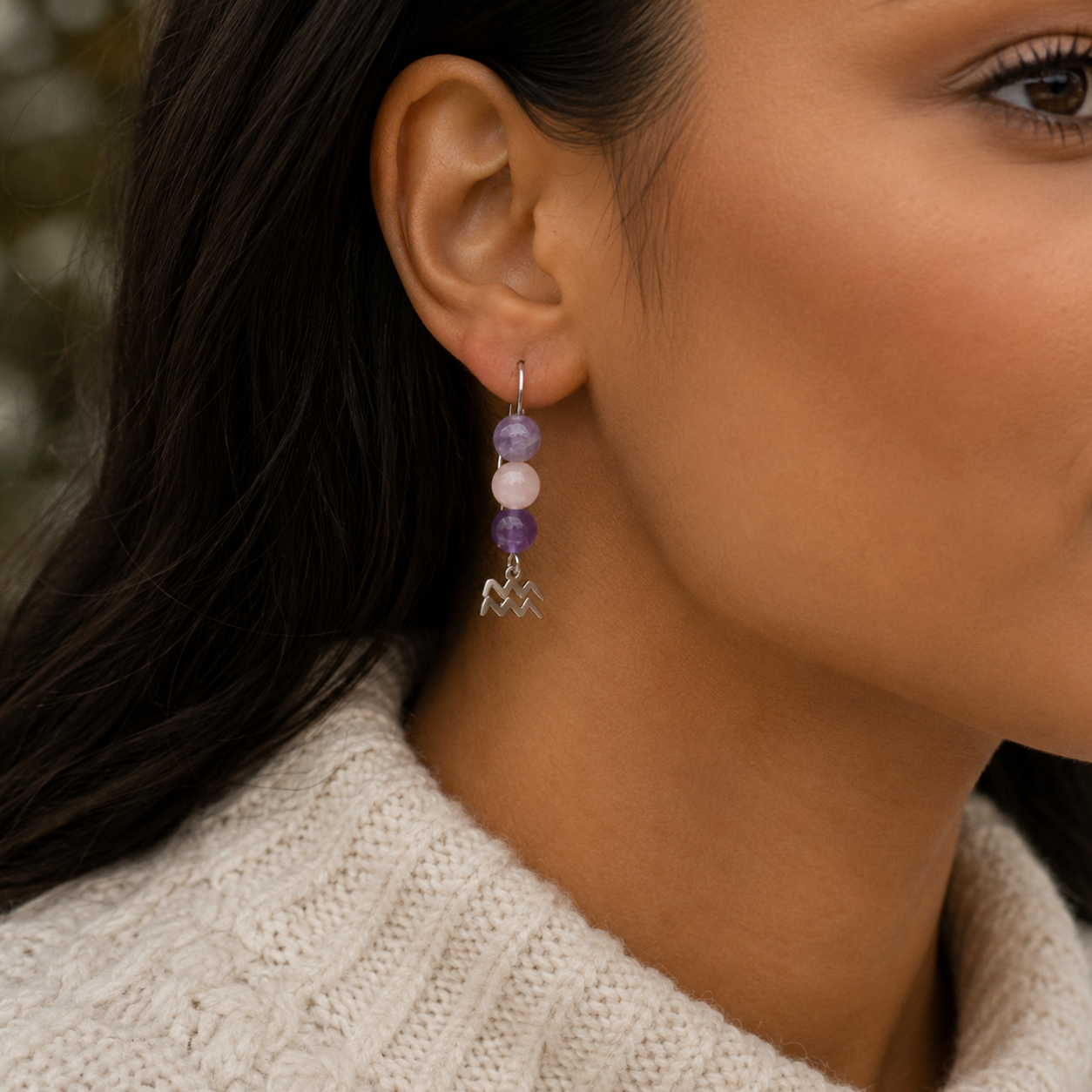 Express the individual spirit of Aquarius with earrings featuring Amethyst, Rose Quartz, and Lepidolite—a gemstone trio symbolizing vision, compassion, and balance.
