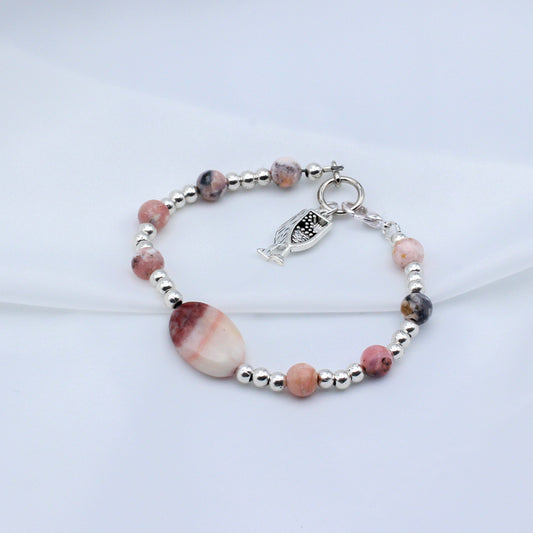 Wine glass charms and stunning Calcite Gemstones and Pewter beads. A secure Lobster Clasp closure.