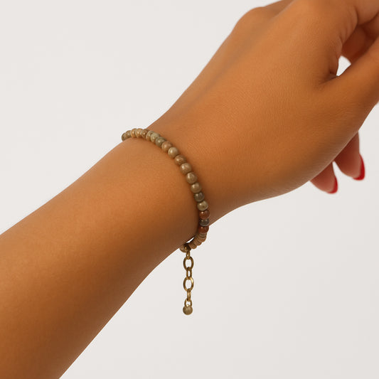 Adorn your wrist with these exquisite Bumble Bee Jasper gemstones, crafted for elegance and style.