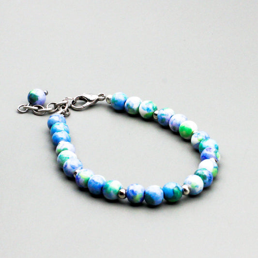 Stainless steel chain with Jasper Gemstones and Pewter Beads. A secure lobster clasp closure.