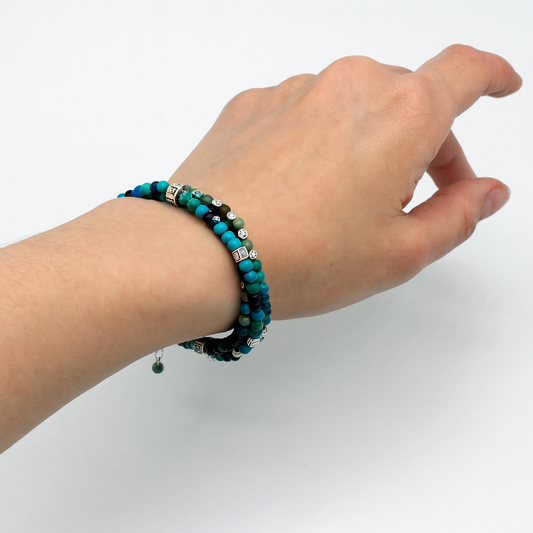 This multi 4 layer bracelet, adjustable from 6 1/2" to 7 1/2" with a chain extender,