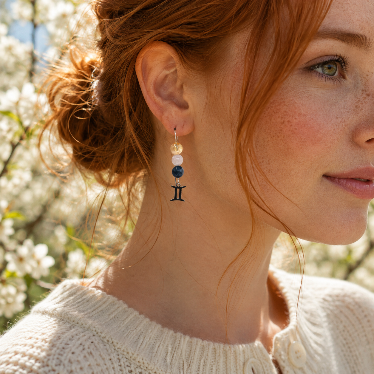 Capture the lively spirit of Gemini with earrings featuring Sodalite, Blue Lace Agate, and Citrine—a gemstone trio symbolizing expression, curiosity, and joy.Finished with a Gemini symbolic charm and suspended from a hand-forged earwire.