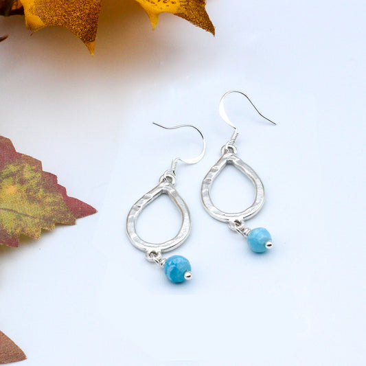 Stunning Larimar Gemstones, set in silver electroplated metal Teardrops for a luxurious and elegant look.
